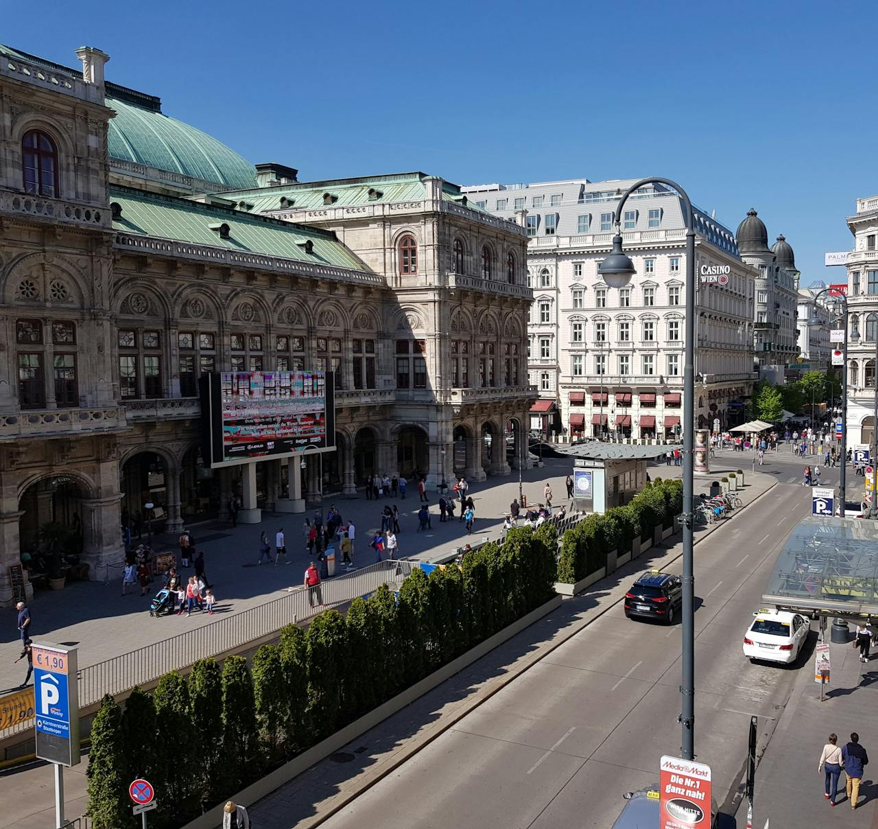 Explore the vibrant streets and iconic architecture of Vienna, Austria from above.
